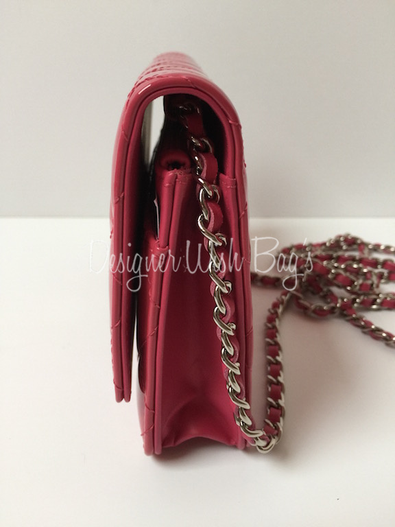 Chanel WOC in Pink diamond quilted Patent Leather with silver hardware.
