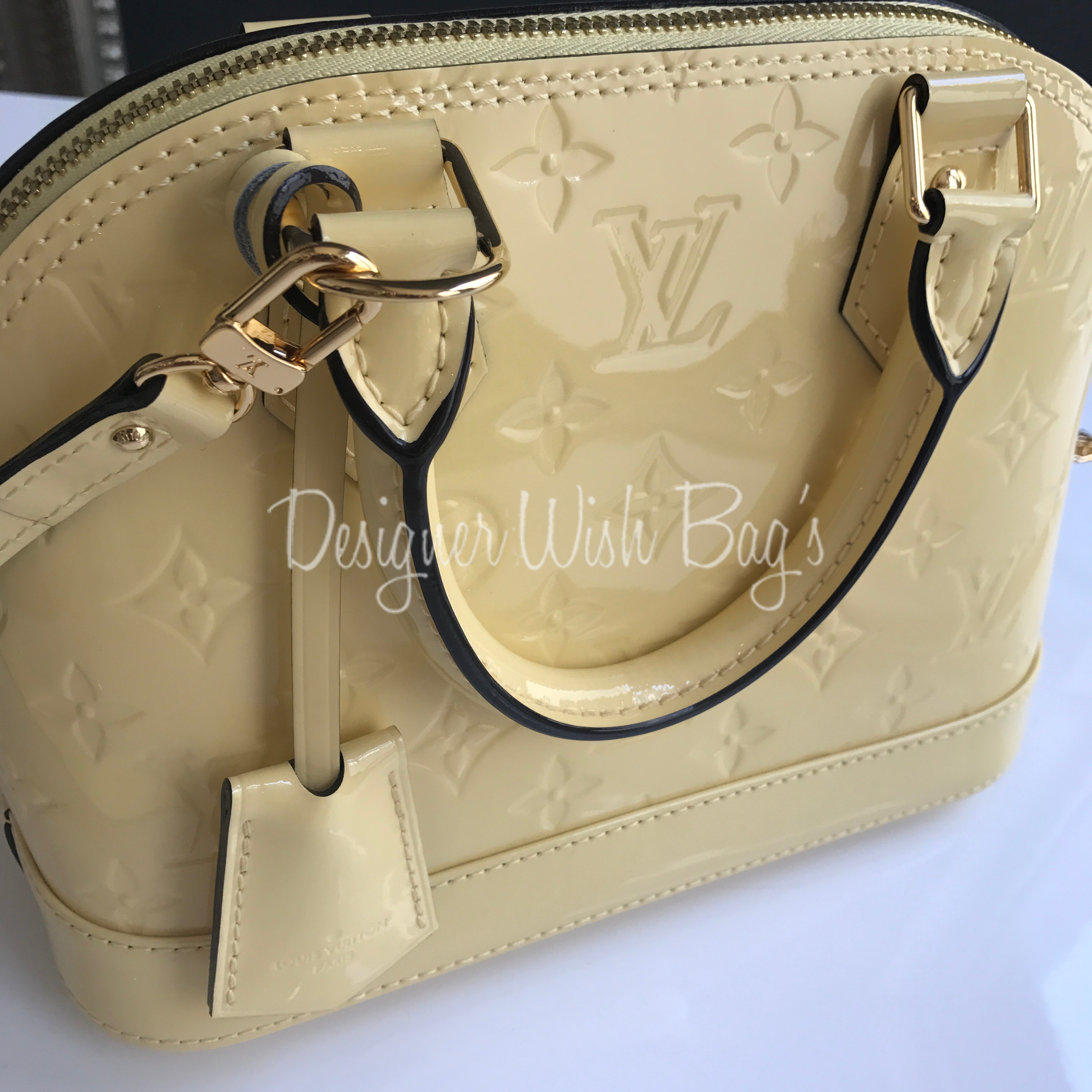 Alma bb patent leather handbag Louis Vuitton Black in Patent leather -  36640945