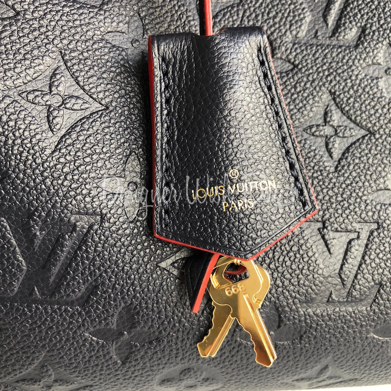 RvceShops Revival, Sac à main Louis Vuitton Speedy 25 cm en cuir monogram  empreinte rouge