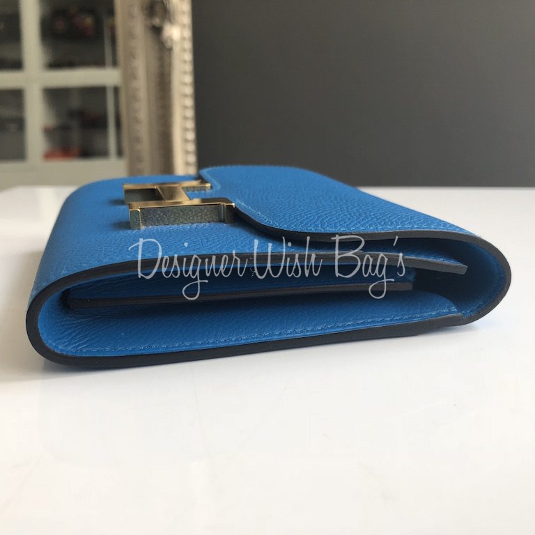 $3000 wire. Preloved 90% new condition Blue Mykonos Ostrich Constance  Compact Wallet Ghw. A stamp no box and receipt.