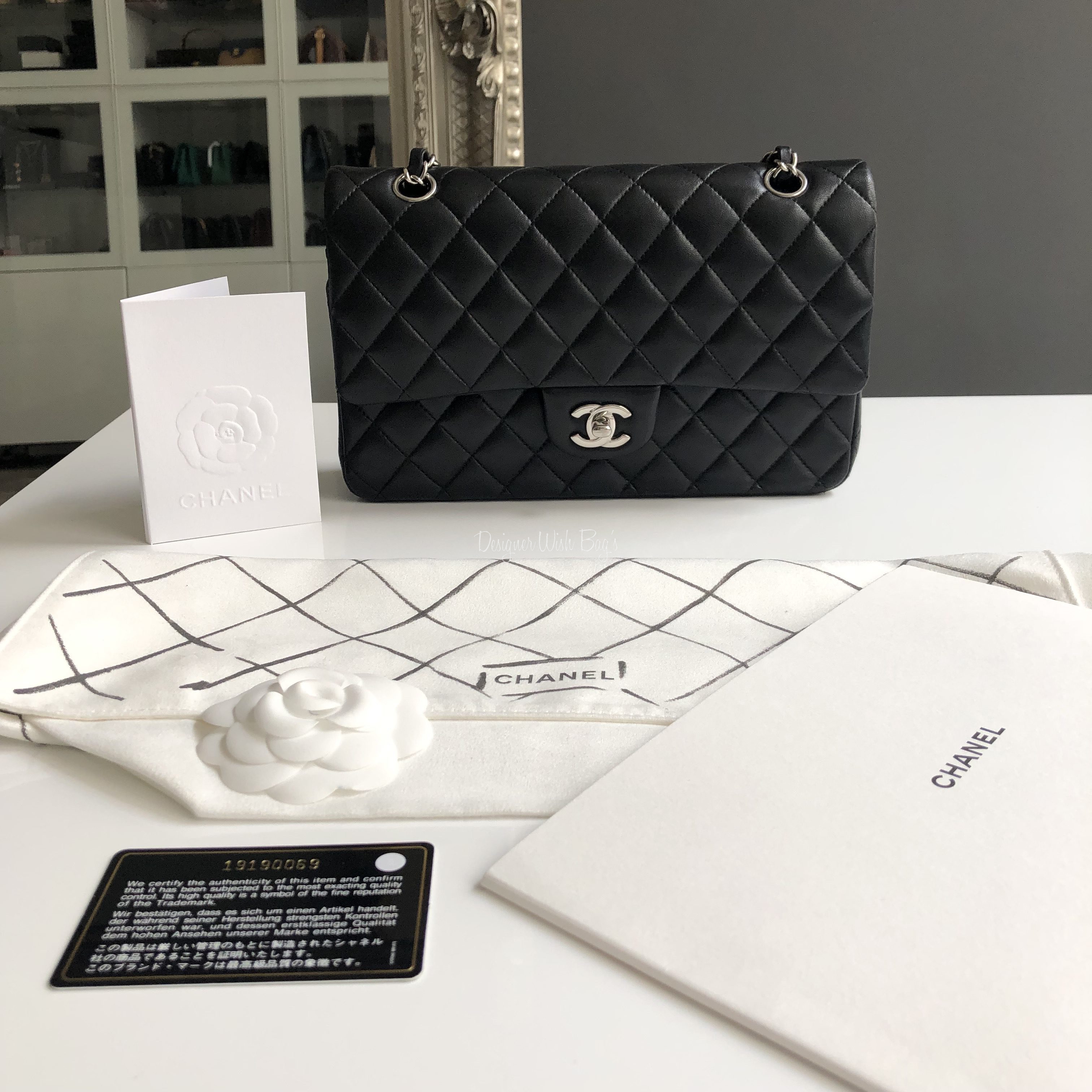 Chanel Jumbo flap measuring 11.9"x8.5"x3" Black Lambskin  Leather With Silver