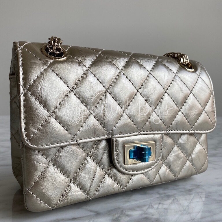 Chanel Coco Embossed Square Mini Flap Bag