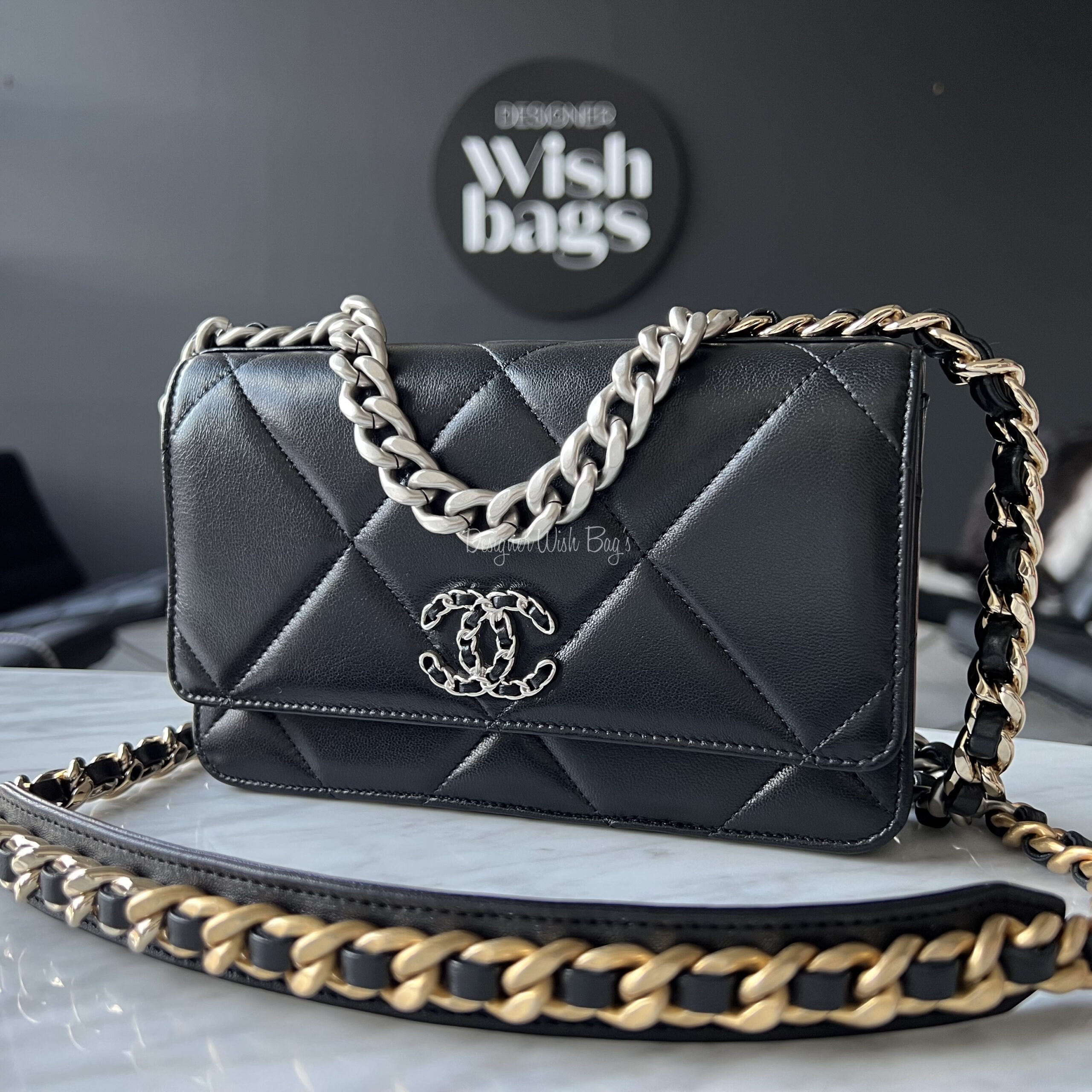 white chanel bag with black logo wallet